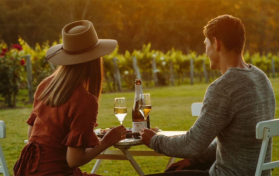 Couple drinking wine at Spicers Vineyard Estate